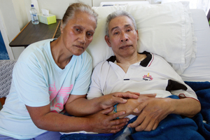 Lutimila Ma'afu with sick husband Semisi Ma'afu Samiu. Photo / Doug Sherring