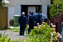 Police detectives working at the scene of a suspicious death in Papakura. Photo / Sarah Ivey Police detectives working at the scene of a suspicious death in Papakura. Photo / Sarah Ivey