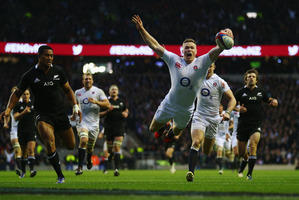 England's Chris Ashton sails through the air as he scores during the final All Blacks match of the 2012 Northern Hemisphere tour Photo / Getty Images