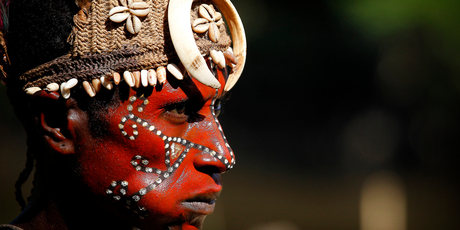 A village woman wearing traditional paint and headgear. Photo / Christine Cornege