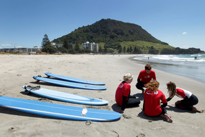 Traditional holiday spots like Mt Maunganui are among popular choices for holidaymakers. Photo / Alan Gibson