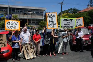 Protesters demonstrate outside the Dargaville Court house yesterday. Photo / Annette Lambly