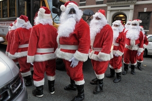 Young minds are sure to wonder how Santa can be everywhere. Photo / AP