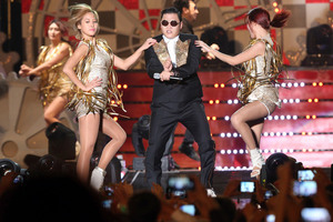 South Korean rapper PSY, center, who was 6th most googled by New Zealanders. Photo / AP