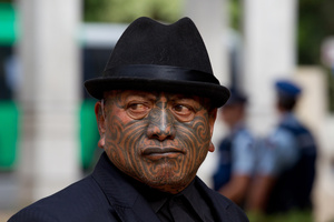 TUhoe activist Tame Iti exercising his artistic style in prison with a painting of misty hills and ghostly figures on the cover of New Zealand Geographic magazine. Photo / Brett Phibbs