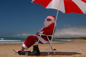 After steaming in his red suit Santa Claus will need a fresh sea breeze. Photo / APN
