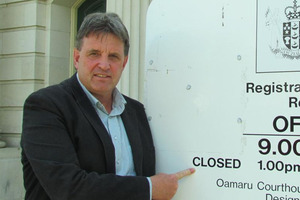 Oamaru lawyer Phil Hope outside the Oamaru District Courthouse, which faces the closure of its court registry office in March. Photo / Andrew Ashton