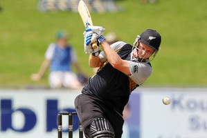 Colin Munro of New Zealand hits out during the T20 Tour match between South Africa A and New Zealand. Photo / Getty Images