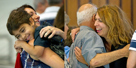 Sabastian Lasuado hugs his aunt, Erica Hussona and Hana Lasuado embraces her father, Ayad Hussona. Photos / Dean Purcell