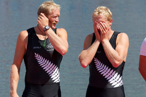 Eric Murray and Hamish Bond stand on the dais after winning gold at the London Olympics. Photo / Brett Phibbs