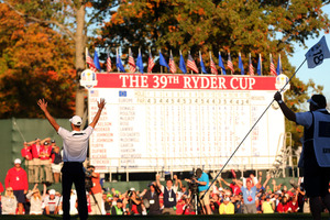 Martin Kaymer of Europe celebrates after making the winning putt as his caddie Craig Connelly watches on the 18th green to win The 39th Ryder Cup. Photo / Getty Images.