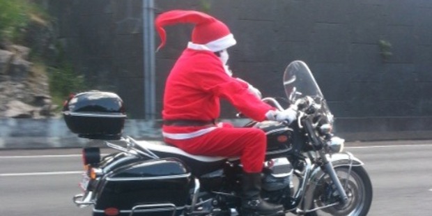 Santa must have given up his reindeer to take on Auckland's Northwestern Motorway on Saturday, says Katrina Williams. Photo / Supplied