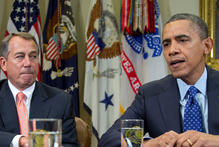 Speaker of the House John Boehner (left) and President Barack Obama are working to avert the fiscal cliff. Photo / AP 
