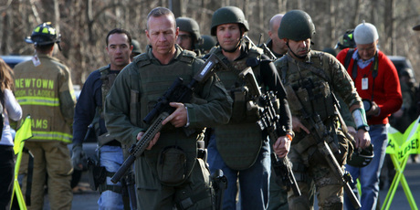 Heavily armed state troopers were sent to the Sandy Hook school. Photo / AP