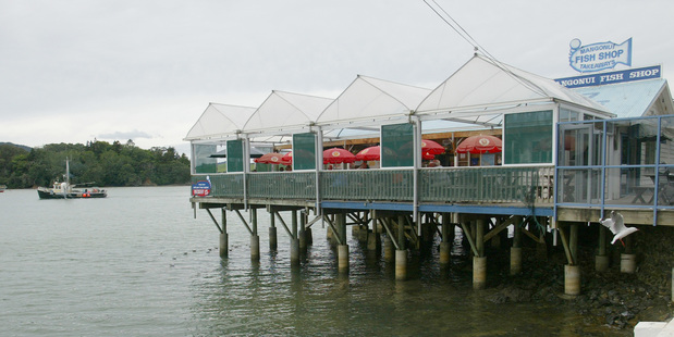 Mangonui's Fish Shop is perched over the bay. Photo / NZ Herald