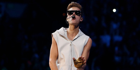 Justin Bieber performs during his Believe Tour. Photo/AP