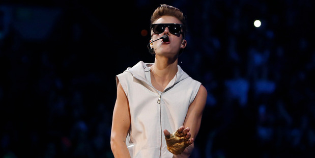 Justin Bieber performs during his Believe Tour. Photo/AP