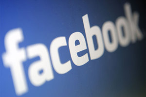 Facebook is testing a service that will charge users $1 to guarantee sent messages arrive in the inboxes of people not on their friend list. Photo / File