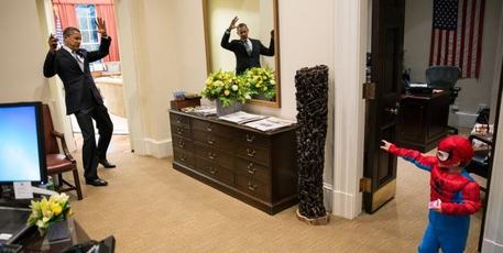 US president Barack Obama became tangled in a young spiderman's web. Photo / Supplied US president Barack Obama became tangled in a young spiderman's web. Photo / Supplied