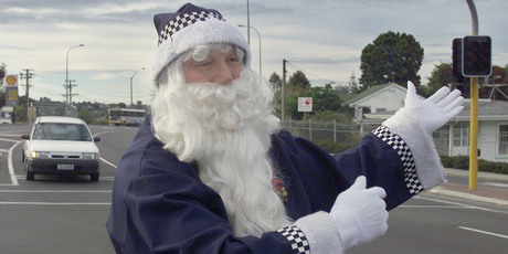 Hobson says the drivers and passengers thoroughly enjoyed the spectacle and he got more than a kick out of it too. Photo / Paul Estcourt, Photo Researcher / Chris Marriner