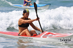 Olympic kayaking champion Lisa Carrington, on her way to the open women's surf ski title at the 2011 New Zealand surf lifesaving championships in Mount Maunganui. Photo / Jamie Troughton