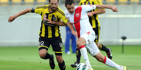 Andrew Durante of the Phoenix defends against Josip Tadic of the Heart during the round 13 A-League match between the Wellington Phoenix and the Melbourne Heart at Westpac Stadium. Photo / Getty Images