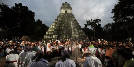 More than 7,000 people visited Tikal to see native Mayan priests hold a colourful ceremony. Photo / AFP