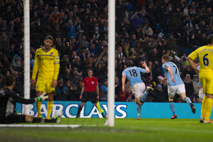 Manchester City's Gareth Barry, center, celebrates after scoring against Reading during their English Premier League soccer match at The Etihad Stadium. Photo / AP