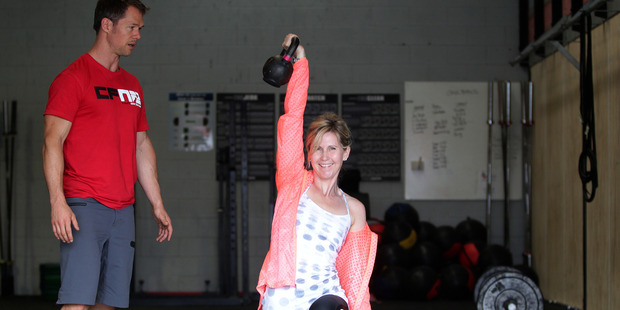 Rachel Grunwell tries CrossFit, an ever-changing workout that simulates functional but challenging movements useful in everyday life and can quickly become addictive. Photo / Doug Sherring