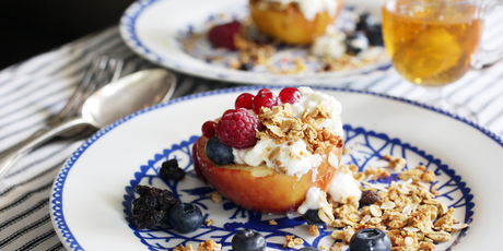 Baked honey apples with berries, muesli and yoghurt. Photo / Doug Sherring