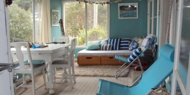 An authentic bach experience awaits at Pohutakawa Cottage. Photo / Supplied
