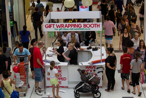 Christmas shoppers at Westfield St Lukes 23 December 2012, New Zealand Herald Photograph by Kellie Blizard