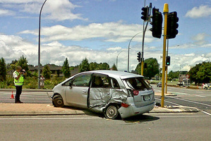 The car in which a 71-year-old woman died was pushed on to a traffic island when it and a four-wheel-drive vehicle collided. Photo / Natalie Akoorie