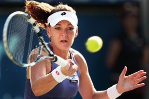 At just 1.72m and 56kg, Agnieszka Radwanska of Poland has to rely on clever tactics to outwit her larger opponents. Photo / Getty Images