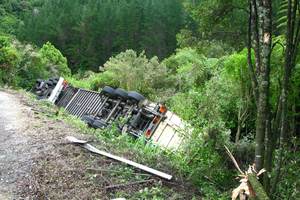 The truck and equipment belonged to a contractor, which was organising the retrieval of the vehicle and its contents from the gorge. Photo / Sheryl Sefton