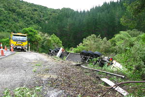 A 16-wheeler articulated lorry crashes 27km from Opotiki in the Waioeka Gorge. The driver escaped unhurt but the lorry was carrying sound equipment for the Rhythm and Vines music festival in Gisborne.