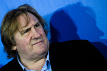 Gerard Depardieu has chosen to live in Belgium while Sebastien Loeb (left) and Richard Gasquet find Swiss tax rules more to their liking. Photo / AP 