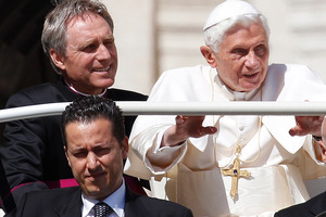 Pope Benedict XVI, right, arrives in St. Peter's square at the Vatican for a general audience as his then-butler Paolo Gabriele. Photo / AP