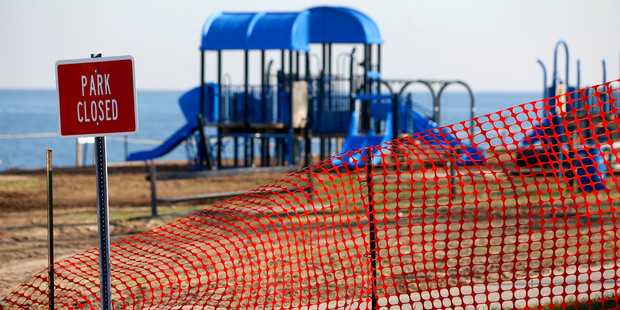 A recreational area is fenced off in an area where high levels of lead were recorded following Superstorm Sandy in Laurence Harbour. Photo / AP