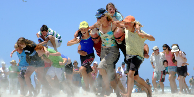 Waihi Beach's New Year's Beach Sports Day celebrates 100 years on Tuesday, with the focus on fun and the Goldminers' original cup. Photo / Sally Gibbs