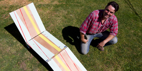 Justin Newcombe with finished portable lawn chair. Photo / Steven McNicholl