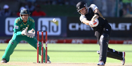 Brendon McCullum of New Zealand drives one into the waiting hands of Justin Ontong of South Africa. Photo / Getty Images