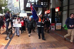 Asset sales protesters make their way down Lambton Quay today. Photo / APNZ