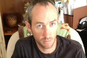Bevan Docherty yesterday posted an image of himself feeding his 6-month-old son, Fletcher, on Twitter. Photo / Supplied