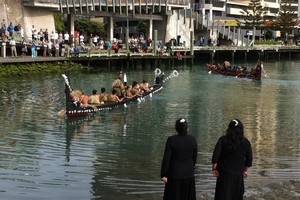 Waka arriving at Wellington's Waitangi Day celebrations at the waterfront. Photo / Matthew Backhouse
