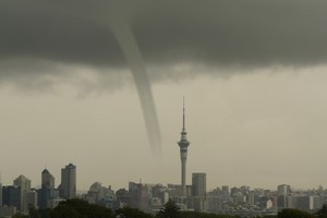 A waterspout seen over Auckland city today, viewed from Northcote. Photo / Christine Keller Smith