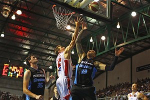 Rhys Martin of the Hawks competes with Leon Henry of the Breakers for the ball. Photo / Getty Images