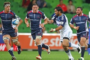 Piri Weepu of the Blues passes the ball during the Super Rugby trial. Photo / Getty Images