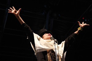 Some danced in bikinis as rain fell during Erykah Badu's performance. Photo / Supplied