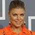 Black Eyed Peas frontwoman, Fergie, has chosen a gorgeous orange lace gown. But a slip wouldn’t go astray. Photo / AP